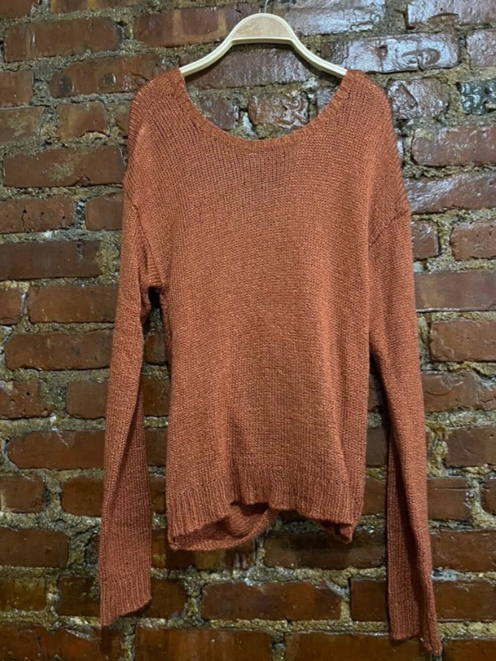 Rust twisted back cross-over sweater